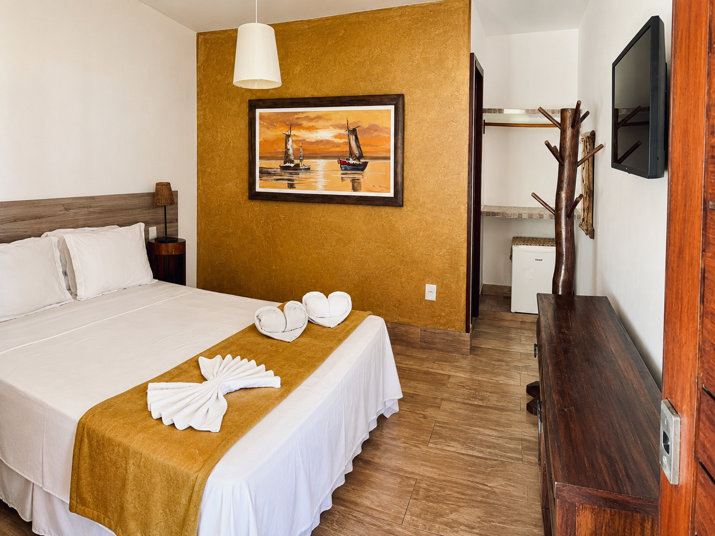 Quarto da Suíte Executiva Superior com cama Queen — Pousada Aconchego Genipabu